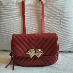 Zara quilted adjustable lion head purse that doubles as a crossbody and belt bag